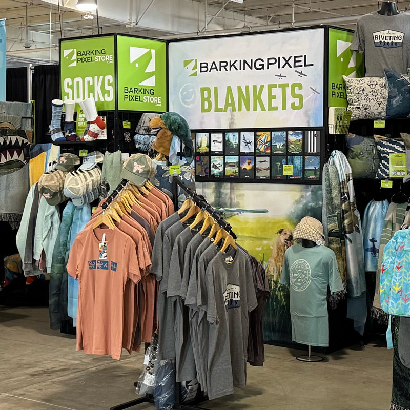 Fall aviation gifts including airplane socks, aviation blanket, T-shirt, and pillow for pilots and airplane lovers