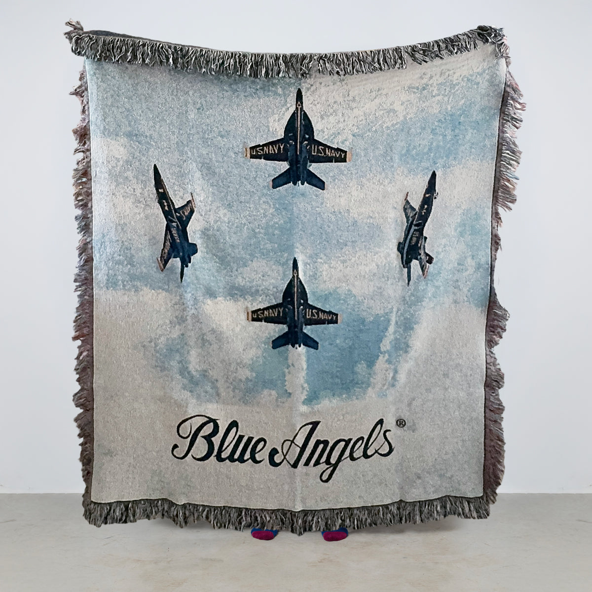 Officially licensed Blue Angels blanket with logo and fighter jets in the sky design