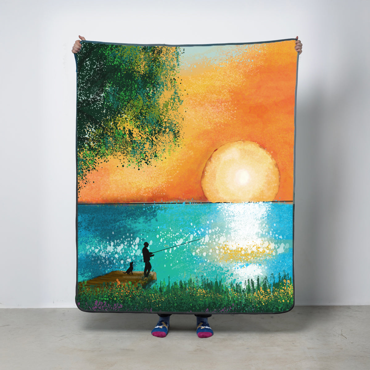 Fleece blanket with a fisherman and dog on a pier with the ocean and sun
