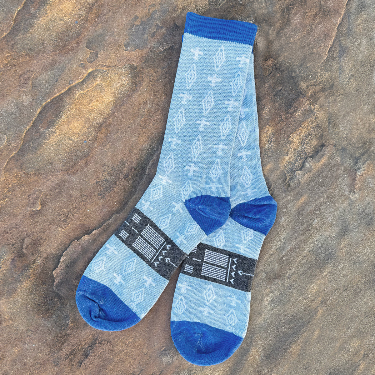 Light blue crew socks with airplanes and diamond pattern