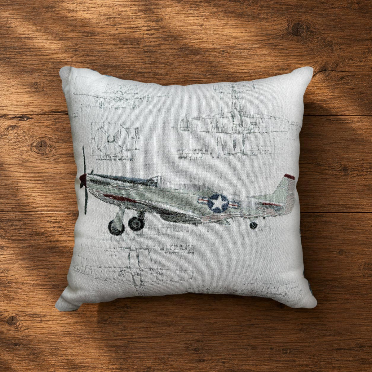 P-51 Mustang airplane profile view with airplane blueprints on a woven pillow