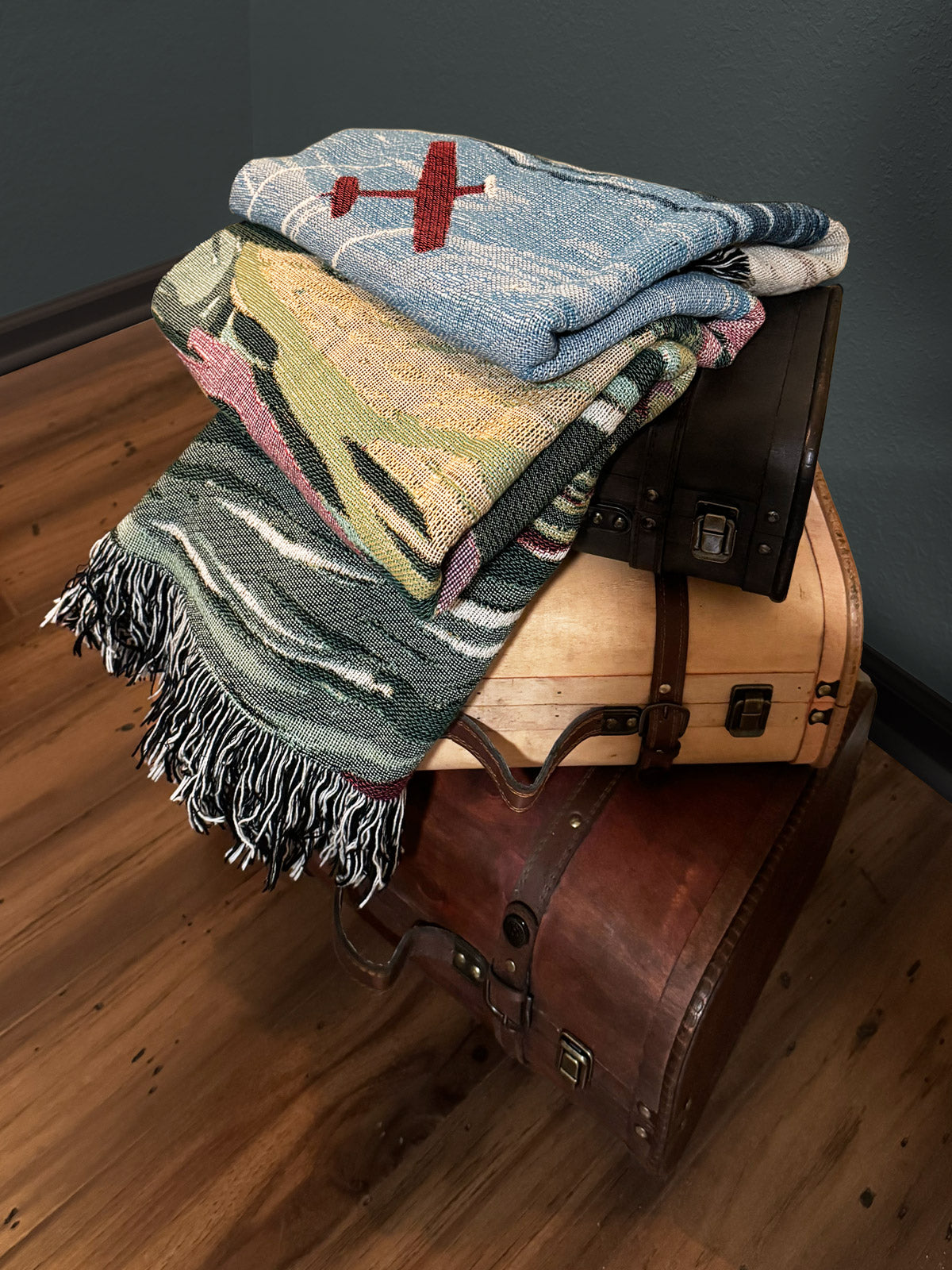 Cozy throw blanket with airplane and landscape multiple earth toned patterna