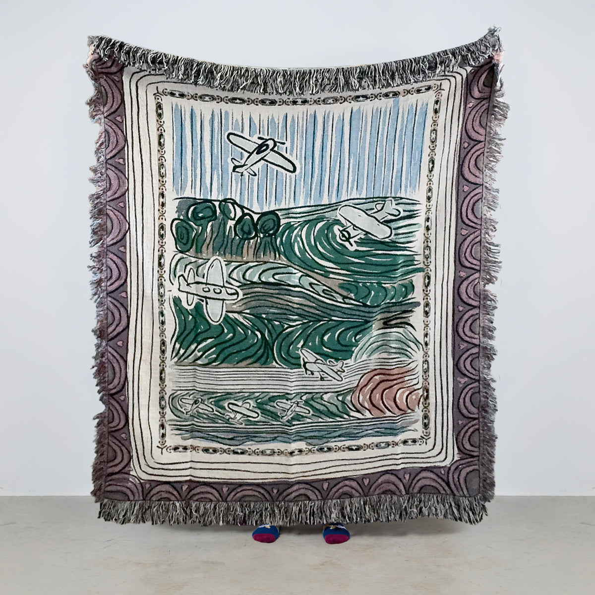Decorative throw blanket with artistic design with airplanes in flight, on the runway and taking off on a white background
