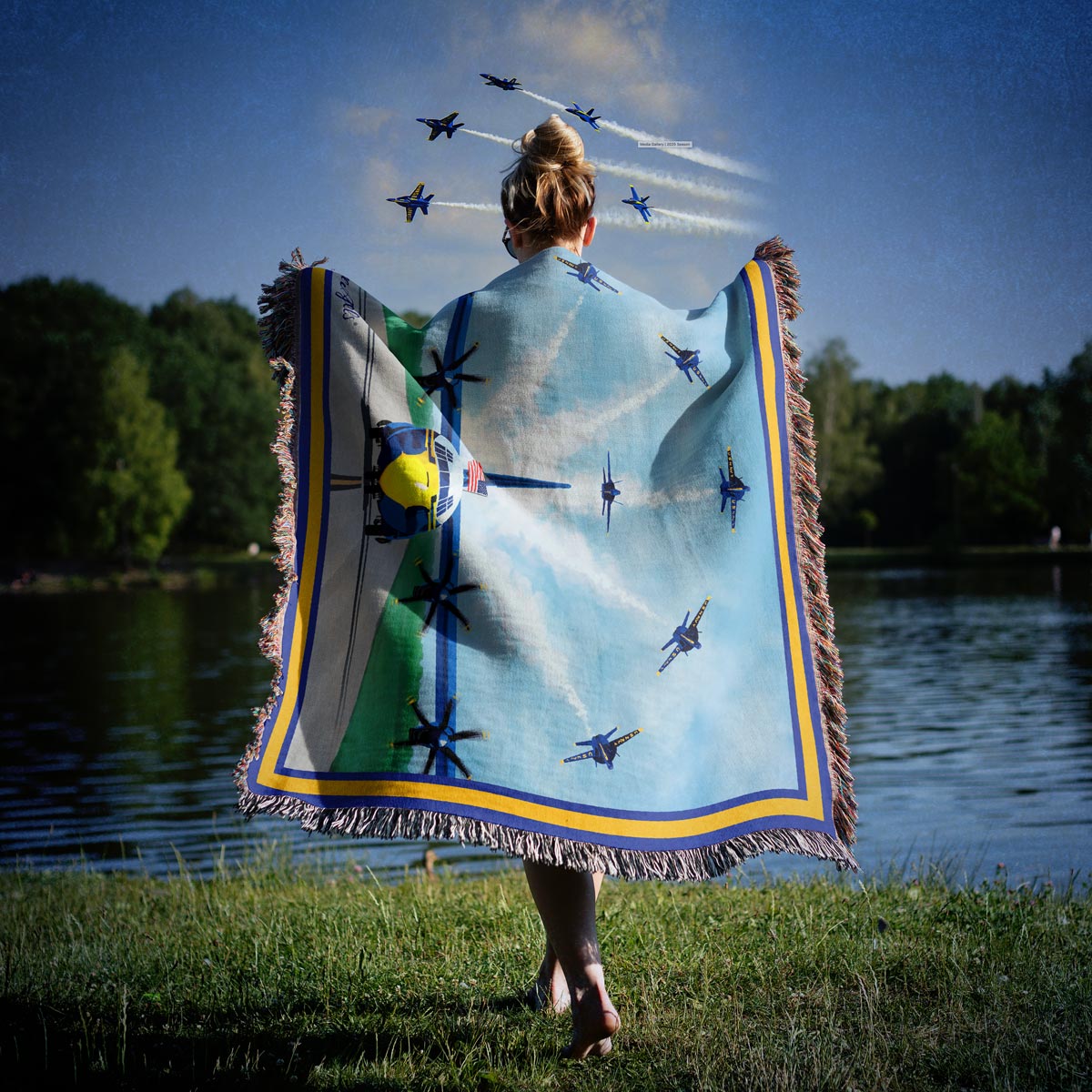 Blue Angels Fat Albert woven blanket featuring the iconic C-130J Hercules aircraft on the runway beneath six Blue Angels F/A-18 Super Hornets in flight formation.
