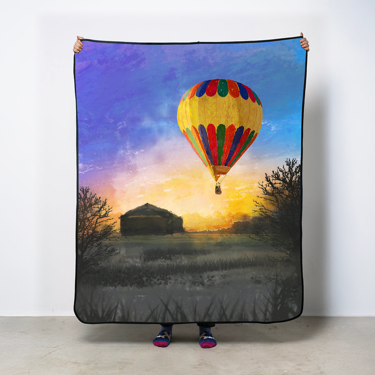 Colorful hot air balloon illustrated and printed on a premium fleece blanket