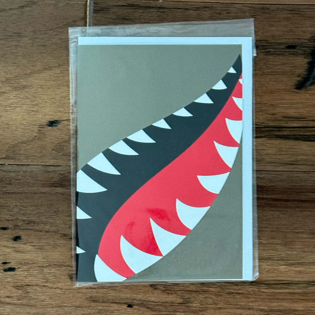 Greeting card with a WWII P-40 Shark Mouth paint scheme design on front.