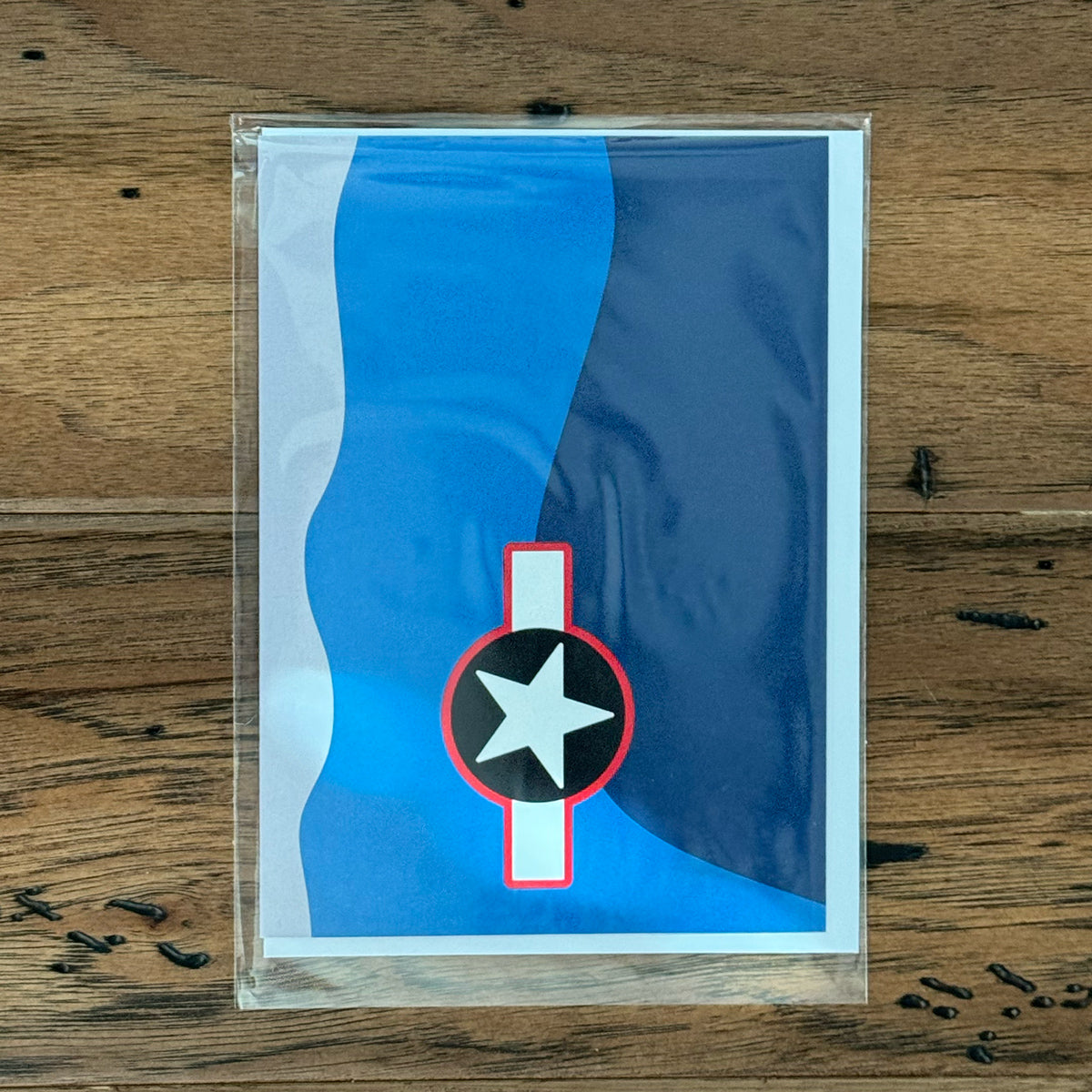 Greeting card with a WWII corsair paint scheme design on front.