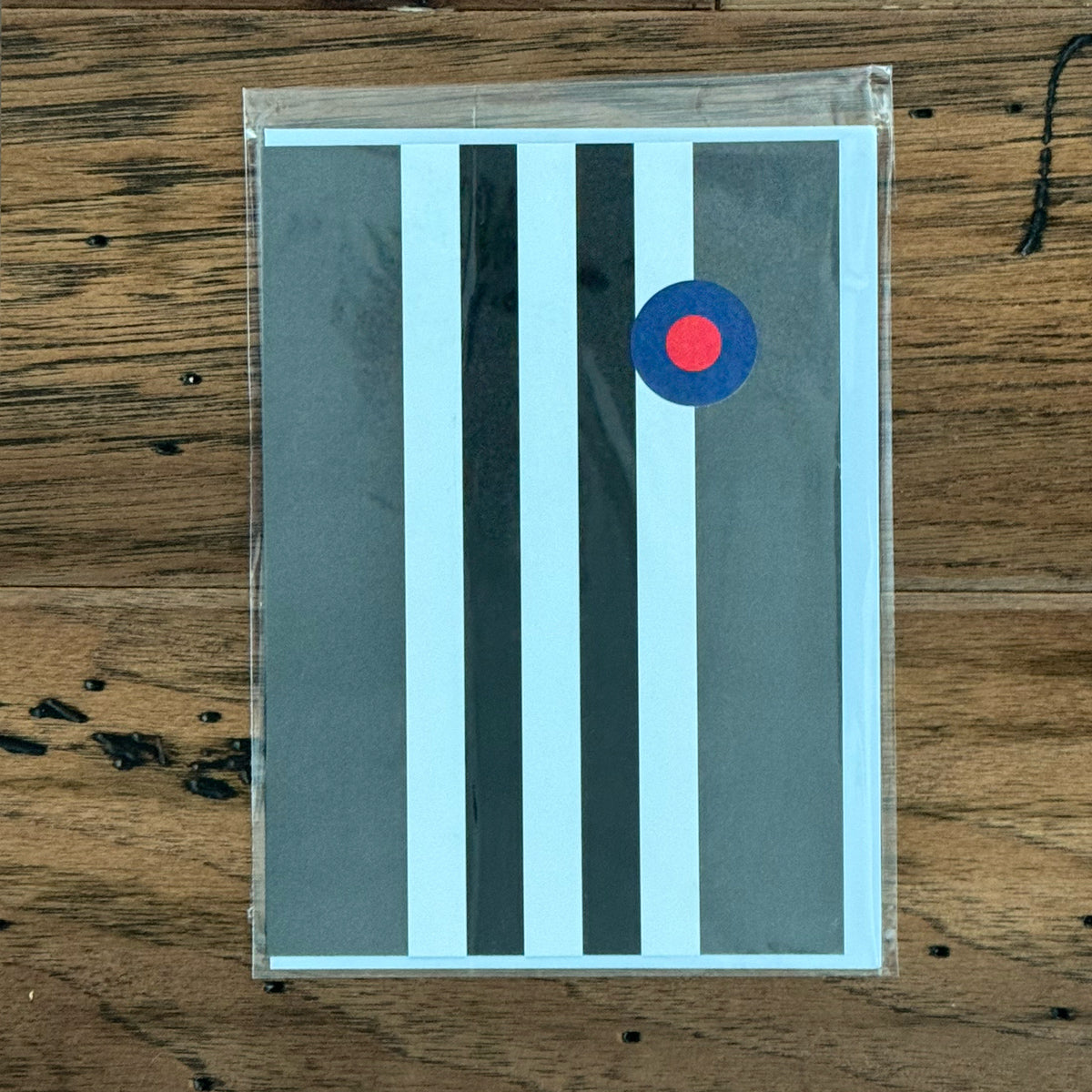 Greeting card with a WWII invasion stripe scheme design on front.