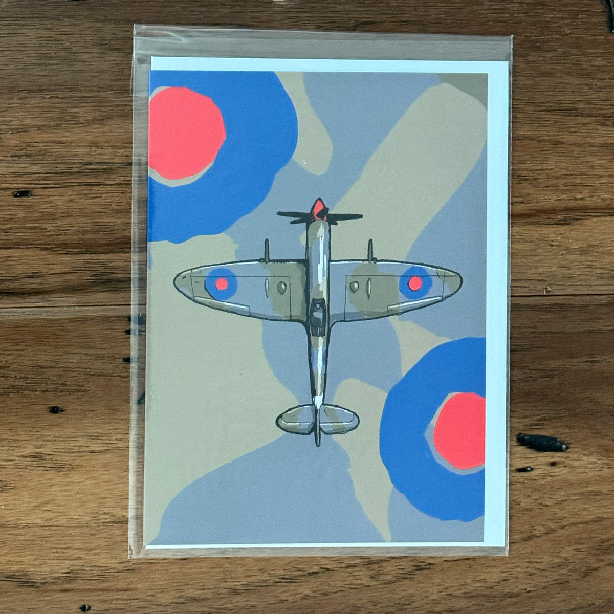 Greeting card with a WWII Spitfire airplane paint illustrated on front.