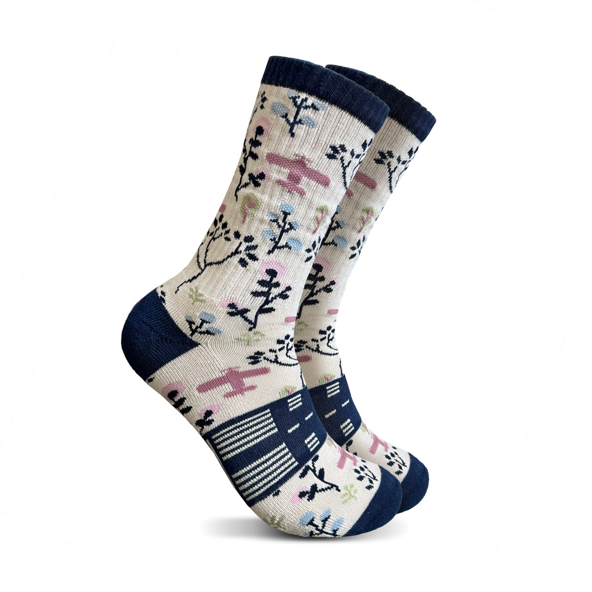 Pair of socks with floral and airplane pattern