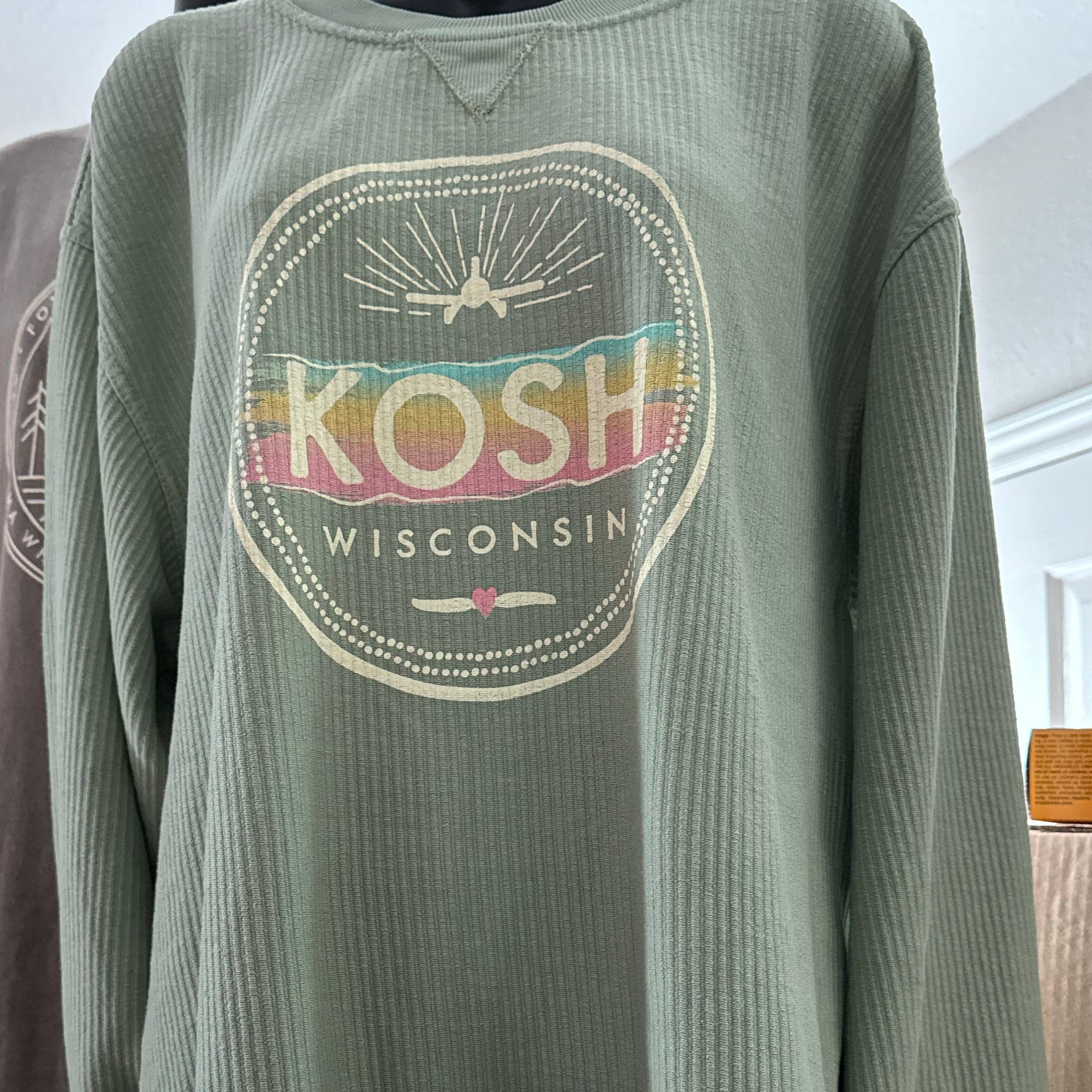 Oshkosh KOSH ladies crewneck sweatshirt with airplane and propeller