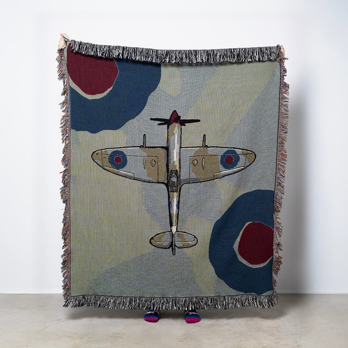 Woven blanket with a spitfire airplane